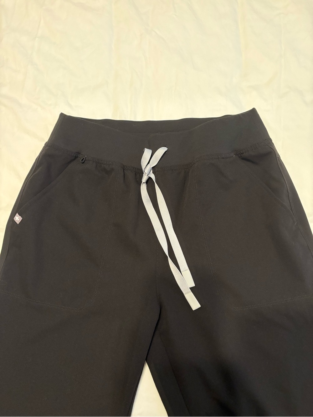 FIGS straight leg high wasted scrub bottoms with ankle zipper detail